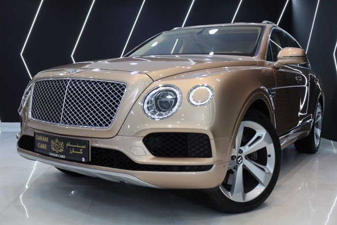 Used Bentley Bentayga I, 6.0 l, 2018 in Dubai by Sanam Cars, Golden color. GCC Specs | AUTO.AE