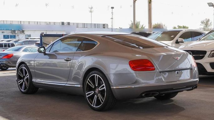 Подержанный Bentley Continental GT II, 4.0 л, 2013 в Дубае от Ibitisam Motors Серый цвет.  | AUTO.AE