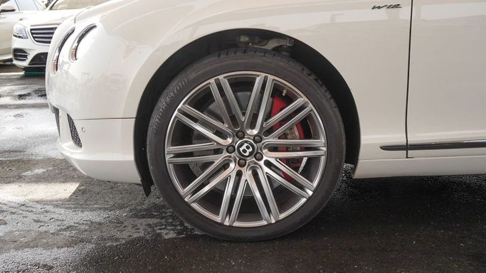 Подержанный Bentley Continental GT II, 6.0 л, 2014 в Дубае от Ibitisam Motors Белый цвет.  | AUTO.AE