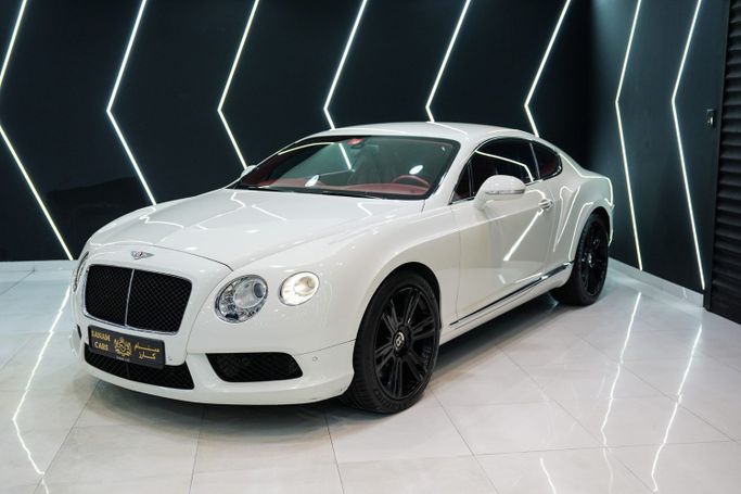 Подержанный Bentley Continental GT II, 4.0 л, 2014 в Дубае от Sanam Cars Белый цвет. GCC | AUTO.AE