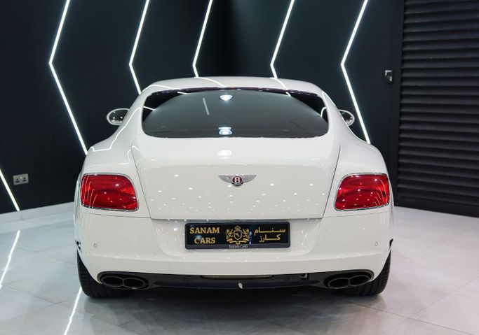 Подержанный Bentley Continental GT II, 4.0 л, 2014 в Дубае от Sanam Cars Белый цвет. GCC | AUTO.AE