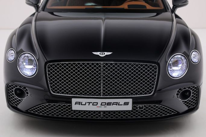 Подержанный Bentley Continental GT III, 4.0 л, 2023 в Дубае от AUTO DEALS Черный цвет. Европейская | AUTO.AE