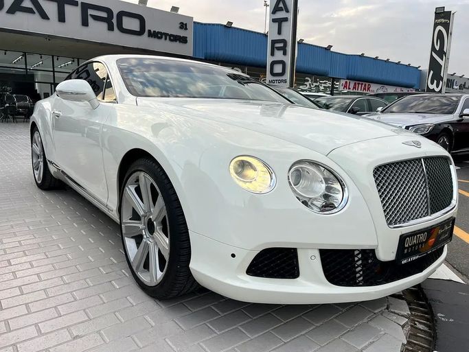 Used Bentley Continental GT II, 6.0 l, 2012 in Dubai by Quatro Motors, White color. GCC Specs | AUTO.AE | Listing #270731