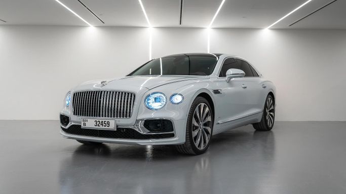 Bentley Flying Spur III, 2020 business sedan for rent in Dubai by POF RENTAL, silver color | AUTO.AE