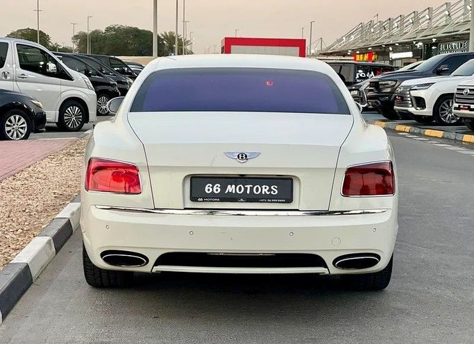 Used Bentley Flying Spur II, 6.0 l, 2016 in Dubai by 66 Motors, White color. GCC Specs | AUTO.AE