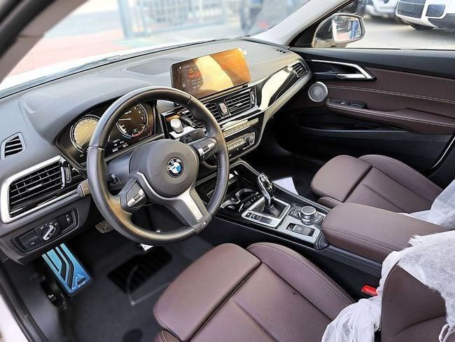 New BMW 1 Series 120i III (F52) Facelift, 1.5 l, 2023 in Dubai by Soltan Auto, White color. Chinese Specs | AUTO.AE