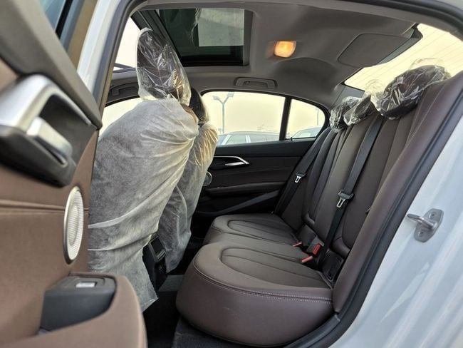 New BMW 1 Series 120i III (F52) Facelift, 1.5 l, 2023 in Dubai by Soltan Auto, White color. Chinese Specs | AUTO.AE