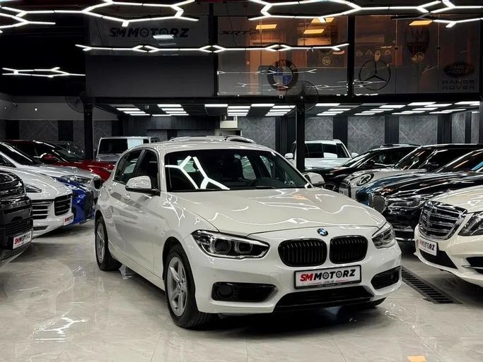 Подержанный BMW 1 Series II (F20/F21) Рестайлинг 2, 2.0 л, 2019 в Дубае от SM MOTORZ Белый цвет. GCC | AUTO.AE | Объявление #247426