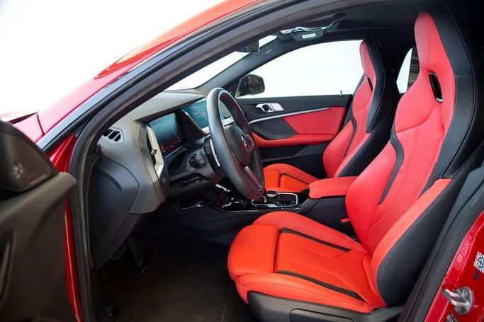 Подержанный BMW 2 Series M235i xDrive F44, 2.0 л, 2023 в Дубае от Exotic Cars Красный цвет. GCC | AUTO.AE