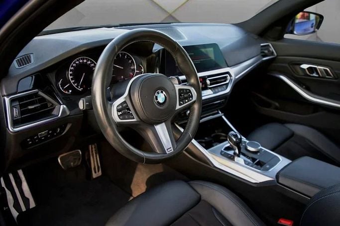 Used BMW 3 Series 330i xDrive VII (G2x), 2.0 l, 2019 in Dubai by Mohammad Alkarak Motors, Blue color. GCC Specs | AUTO.AE