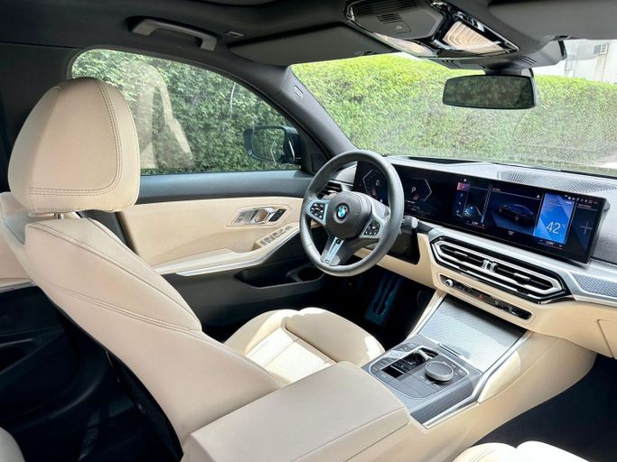 Подержанный BMW 3 Series 320i VII (G2x) Рестайлинг, 2.0 л, 2023 в Дубае от Express Motors Черный цвет. Корейская | AUTO.AE