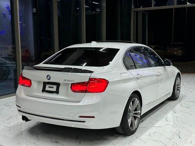 Подержанный BMW 3 Series 330i xDrive VI (F3x) Рестайлинг, 2.0 л, 2018 в Дубае от F1 Motors Белый цвет. Американская | AUTO.AE