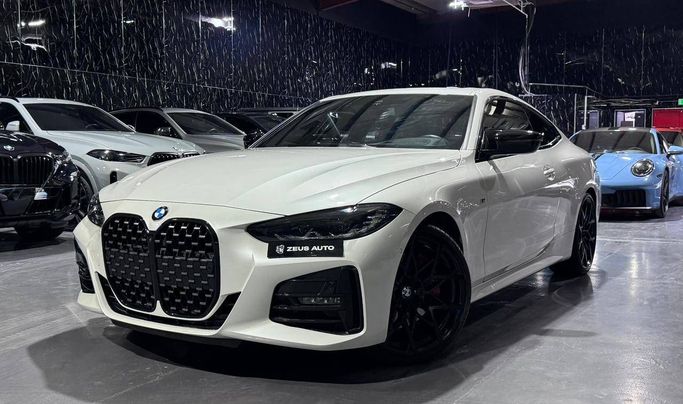 Подержанный BMW 4 Series 430i G22, G23, G26, 2.0 л, 2021 в Дубае от Zeus Motors Белый цвет. GCC | AUTO.AE