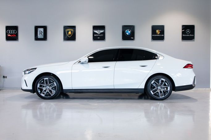 Used BMW 5 Series 520i VII (G30/G31) Facelift, 2.0 l, 2023 in Dubai by C7 Motors, White color. Korean Specs | AUTO.AE