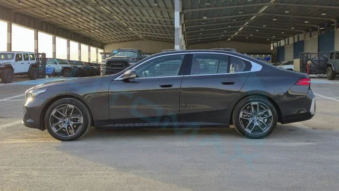 New BMW 5 Series 520i VIII (G60/G61/G68), 2.0 l, 2025 in Dubai by Auto Max Group, Grey color. GCC Specs | AUTO.AE