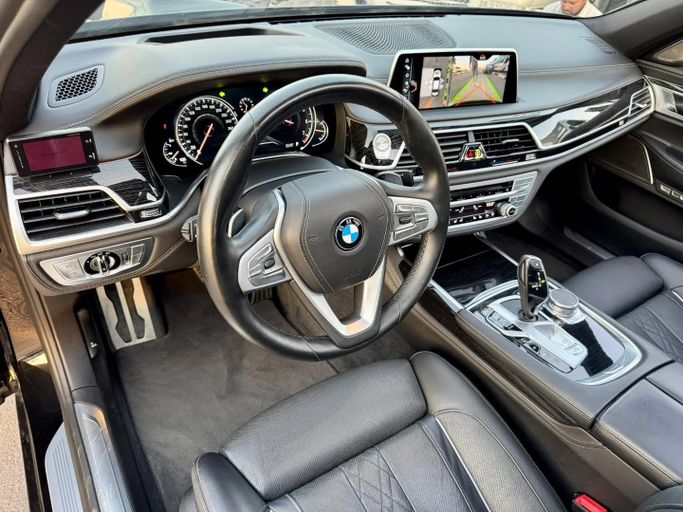 Used BMW 7 Series 750i VI (G11/G12), 4.4 l, 2017 in Dubai by Saeed Auto, Black color. Japanese Specs | AUTO.AE