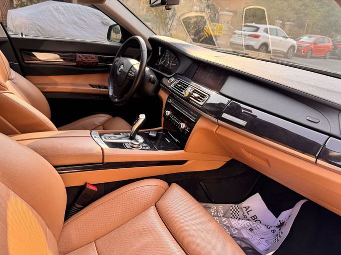 Used BMW 7 Series Active Hybrid V (F01/F02/F04) Facelift, 3.0 l, 2013 in Dubai, Blue color. Japanese Specs | AUTO.AE