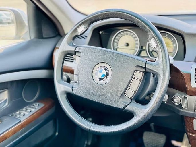 Used BMW 7 Series 735i IV (E65/E66), 3.6 l, 2003 in Dubai by Al Abbas Motors, Silver color. Japanese Specs | AUTO.AE