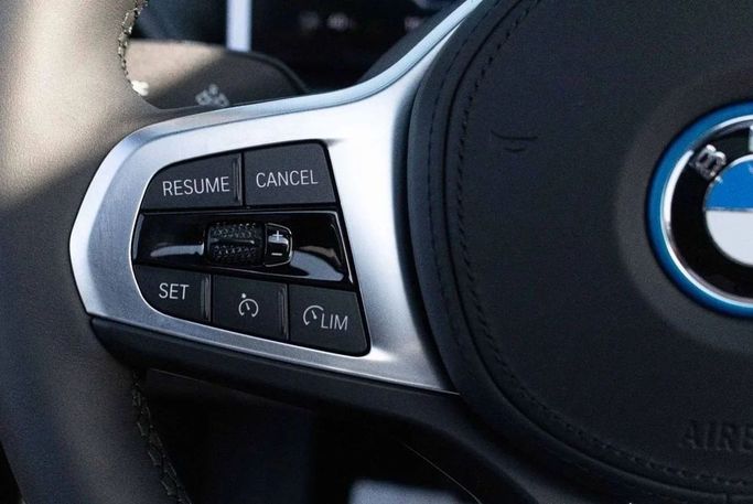 Новый BMW i4 eDrive40 G26 Рестайлинг, 2025 в Дубае от Albustanji Motors FZCO Черный цвет.  | AUTO.AE