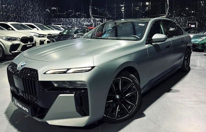 Used BMW i7 xDrive60, 2022 in Dubai by Zeus Motors, Grey color. European Specs | AUTO.AE