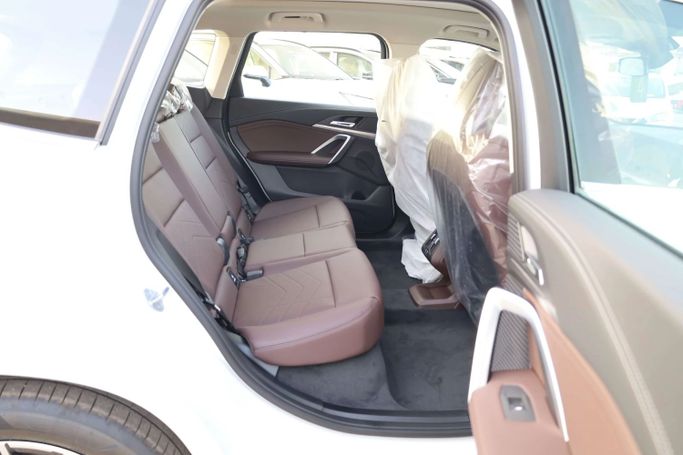 New BMW iX1 eDrive, 2025 in Dubai by JES Motors, White color.  | AUTO.AE