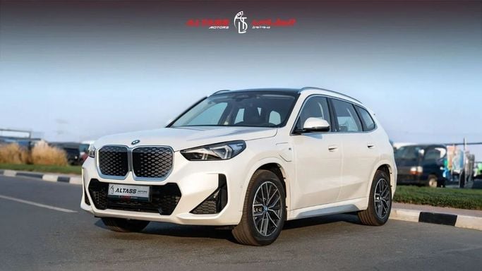 New BMW iX1 eDrive, 2022 in Dubai by Altass Motors, White color. Other | AUTO.AE