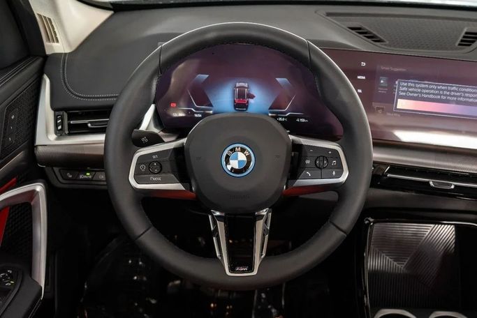 New BMW iX1 eDrive, 2022 in Dubai by Altass Motors, Black color. Other | AUTO.AE