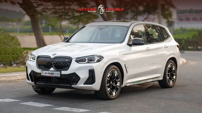 New BMW iX3 I (G08) Facelift, 2025 in Dubai by Altass Motors, White color.  | AUTO.AE