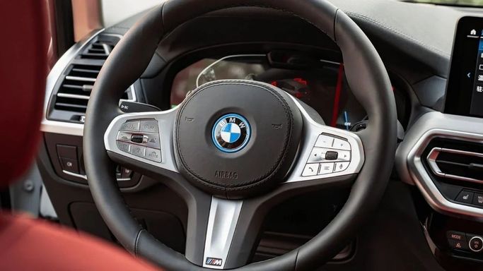 New BMW iX3 I (G08) Facelift, 2025 in Dubai by Altass Motors, White color.  | AUTO.AE