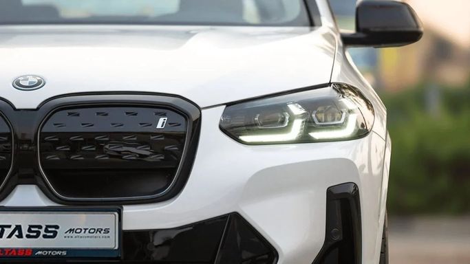 New BMW iX3 I (G08) Facelift, 2025 in Dubai by Altass Motors, White color. Other | AUTO.AE
