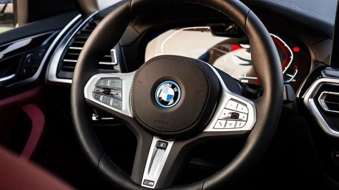 New BMW iX3 I (G08) Facelift, 2025 in Dubai by Altass Motors, White color. Other | AUTO.AE