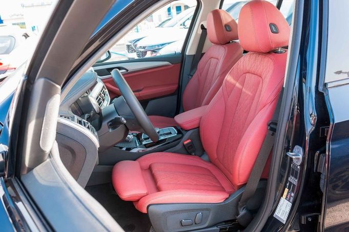 New BMW iX3 I (G08) Facelift, 2025 in Dubai by Albakheet Motors, Black color. Chinese Specs | AUTO.AE