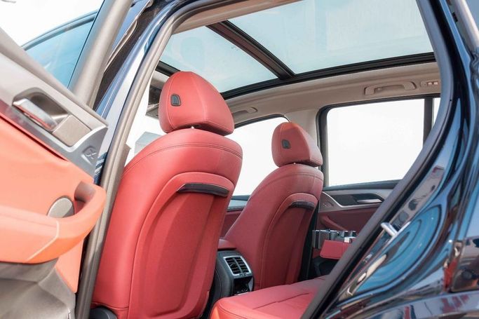 New BMW iX3 I (G08) Facelift, 2025 in Dubai by Albakheet Motors, Black color. Chinese Specs | AUTO.AE