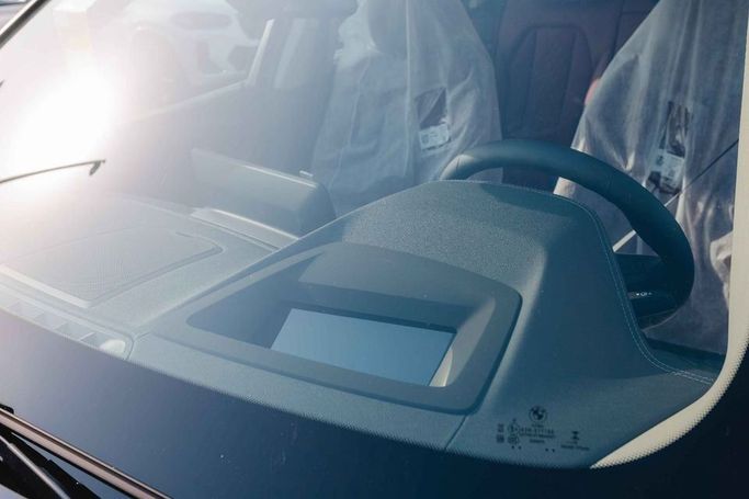 New BMW iX3 I (G08) Facelift, 2025 in Dubai by Albakheet Motors, Black color. Chinese Specs | AUTO.AE