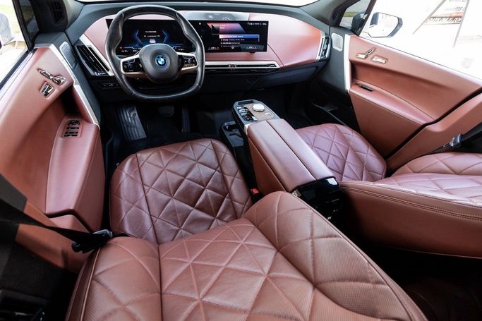 Used BMW iX xDrive50 I (I20), 2023 in Dubai by Linda Cars, White color. GCC Specs | AUTO.AE