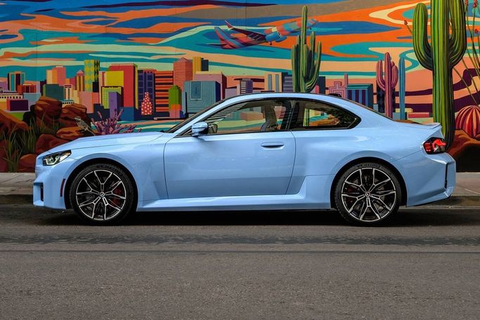 BMW M2 G87, 2024 sport coupe for rent in Dubai by DEIZ, light blue color | AUTO.AE