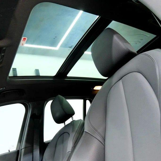 Used BMW X1 20i sDrive II (F48) Facelift, 2.0 l, 2022 in Dubai by Carzilla Motors, Black color. GCC Specs | AUTO.AE