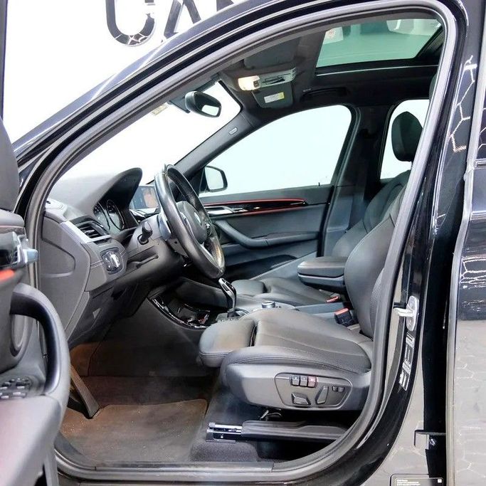 Used BMW X1 20i sDrive II (F48) Facelift, 2.0 l, 2022 in Dubai by Carzilla Motors, Black color. GCC Specs | AUTO.AE