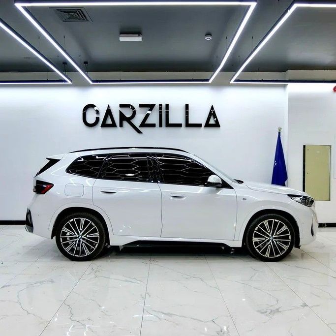 Used BMW X1 20i sDrive III (U11/U12), 1.5 l, 2023 in Dubai by Carzilla Motors, White color. GCC Specs | AUTO.AE