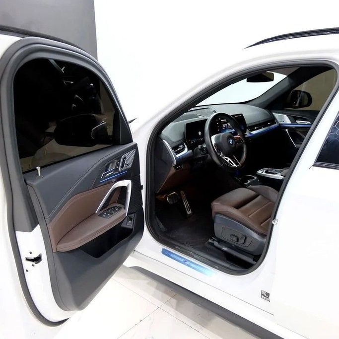 Used BMW X1 20i sDrive III (U11/U12), 1.5 l, 2023 in Dubai by Carzilla Motors, White color. GCC Specs | AUTO.AE
