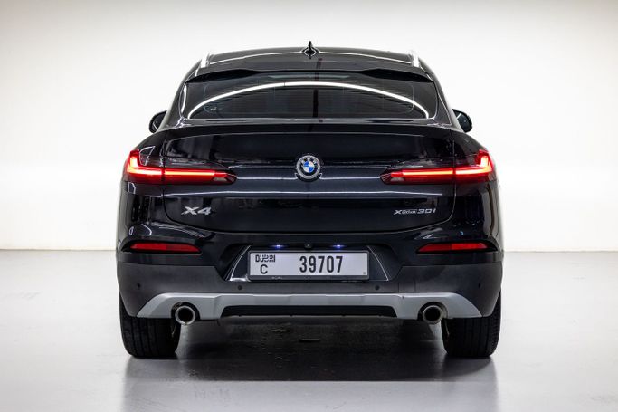BMW X4 M40i II (G02), 2021 standard suv 5 dr. for rent in Dubai by POF RENTAL, black color | AUTO.AE