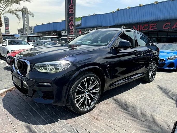 Подержанный BMW X4 30i II (G02) Рестайлинг, 2.0 л, 2021 в Дубае от Nice Cars Motos Черный цвет. GCC | AUTO.AE