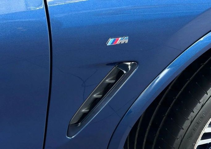 Used BMW X4 30i II (G02), 2.0 l, 2021 in Dubai by The One Motors, Blue color. GCC Specs | AUTO.AE