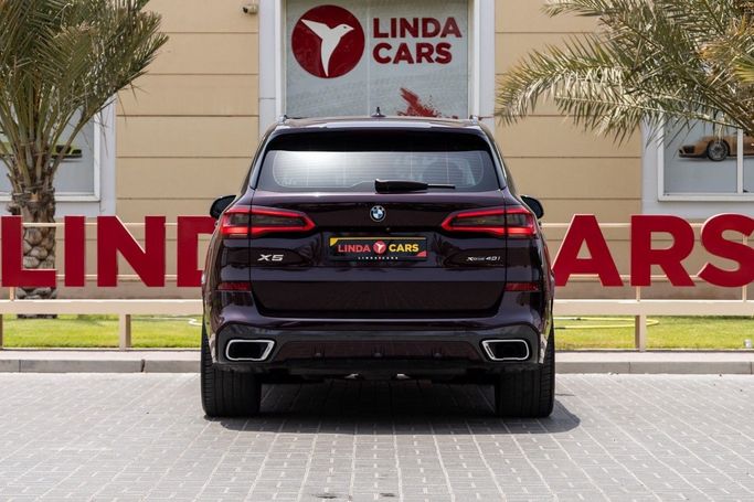 Used BMW X5 40i IV (G05/G18), 3.0 l, 2020 in Dubai by Linda Cars, Maroon color. GCC Specs | AUTO.AE