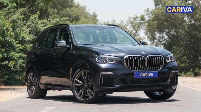 Used BMW X5 M50i IV (G05/G18), 4.4 l, 2023 in Dubai by Cariva Used Cars , Blue color. GCC Specs | AUTO.AE