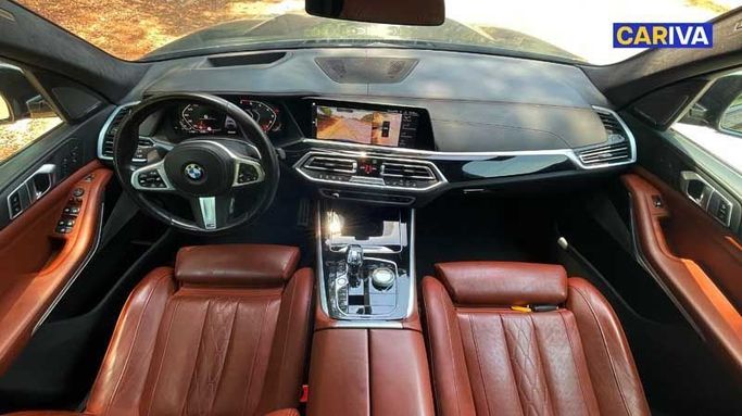 Used BMW X5 M50i IV (G05/G18), 4.4 l, 2023 in Dubai by Cariva Used Cars , Blue color. GCC Specs | AUTO.AE