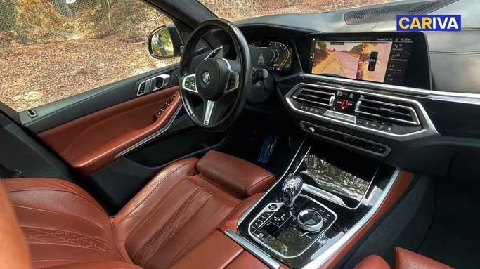 Used BMW X5 M50i IV (G05/G18), 4.4 l, 2023 in Dubai by Cariva Used Cars , Blue color. GCC Specs | AUTO.AE