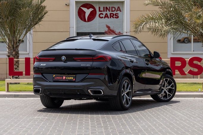 Подержанный BMW X6 40i III (G06), 3.0 л, 2020 в Дубае от Linda Cars Черный цвет. GCC | AUTO.AE