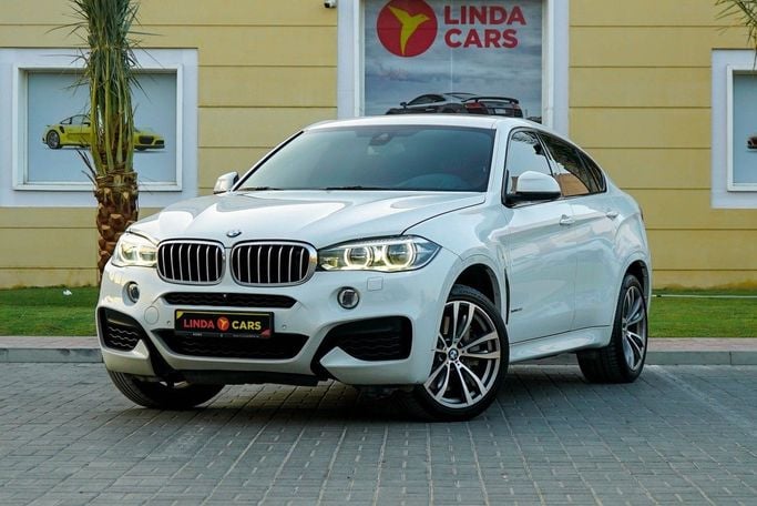 Подержанный BMW X6 50i II (F16), 4.4 л, 2015 в Дубае от Linda Cars Белый цвет. Европейская | AUTO.AE