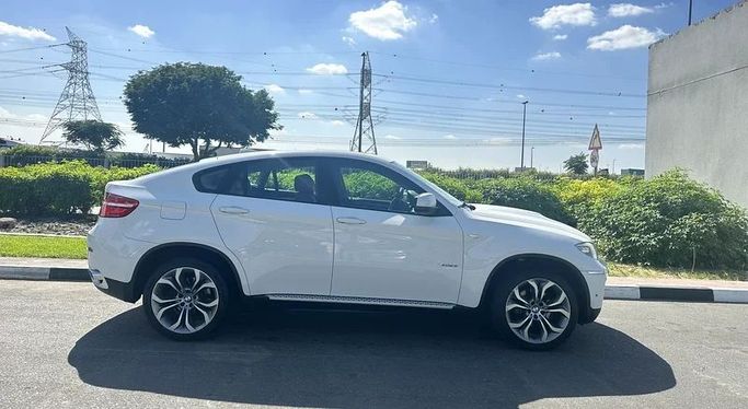 Подержанный BMW X6 35i I (E71) Рестайлинг, 3.0 л, 2014 в Дубае от Formula Motors Белый цвет. GCC | AUTO.AE